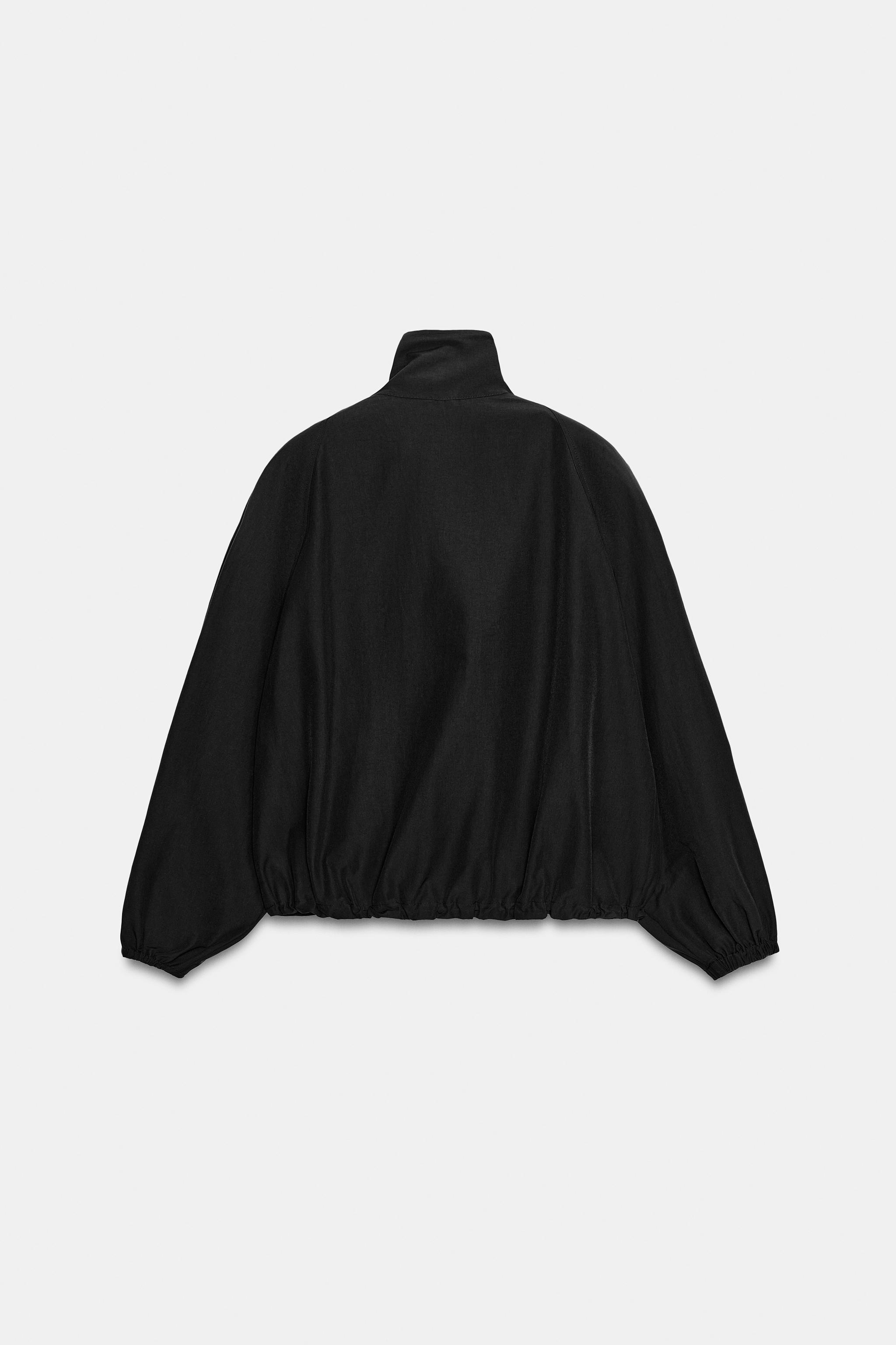 VESTE EN TISSU TECHNIQUE À ÉPAULIETTES